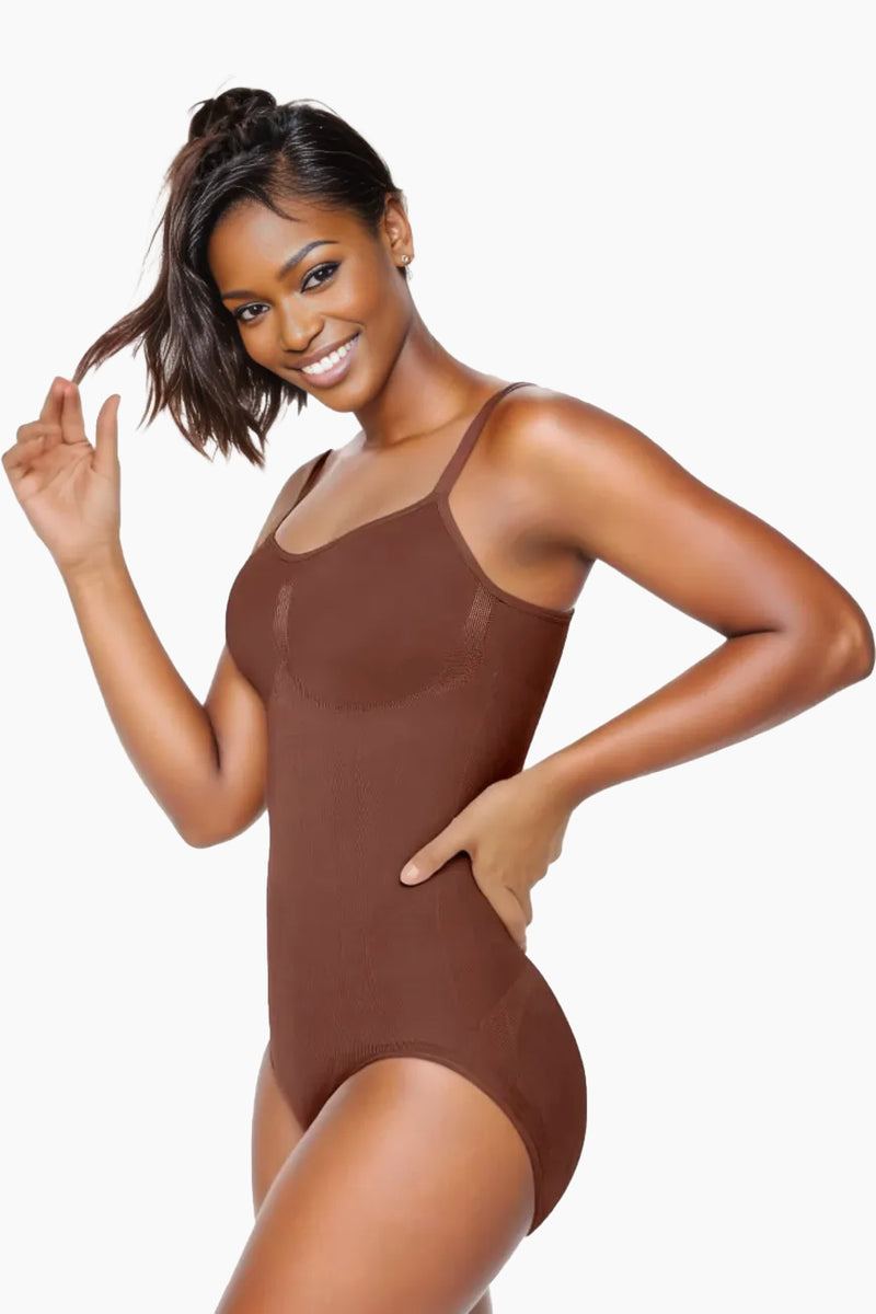 Comfort Evolution Bodysuit by Curveez in nude tone, offering moderate compression for a sleek, sexy silhouette. Full-body shapewear ideal for daily wear.