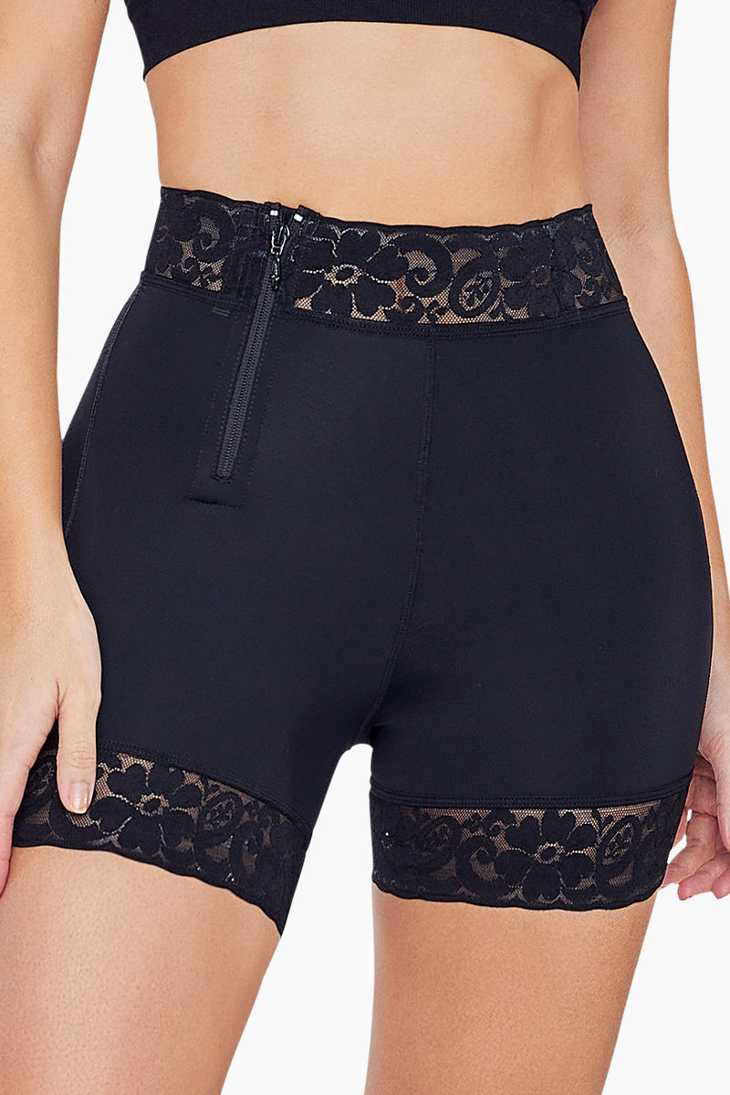 BBL Effect Easy Sculpt Hi-Cut Shorts in black with lace trim, featuring front zipper and high-waist design for shaping and support.